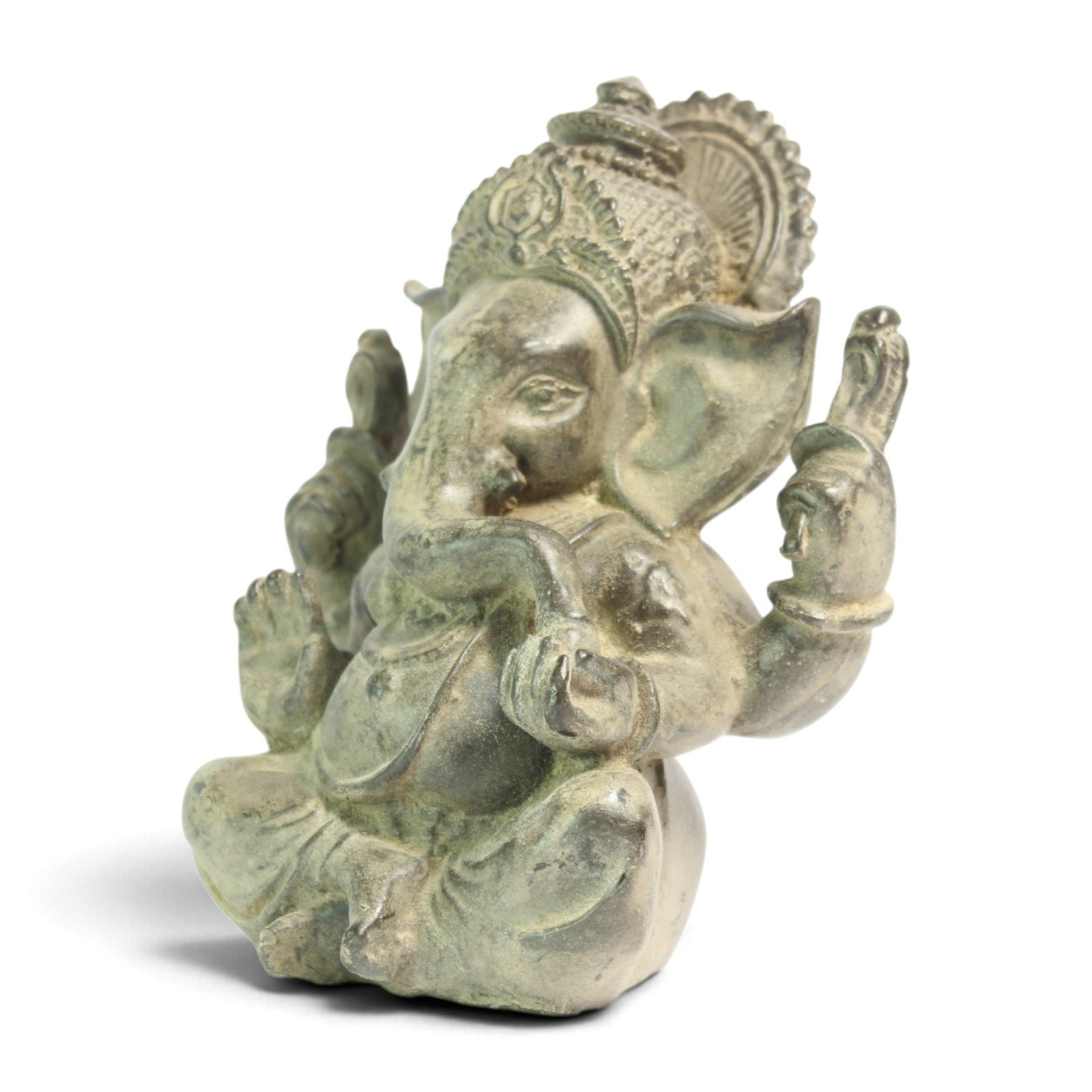 Three-quarter angle view of the Ganesha statue showing crown and seated posture