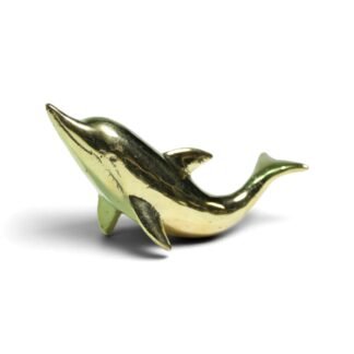 Solid brass dolphin figurine in gold-tone finish against a white background