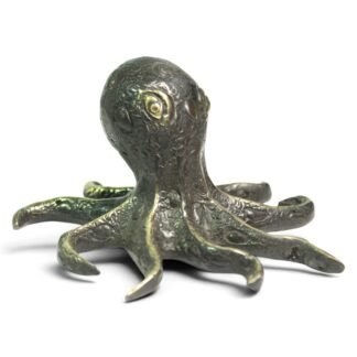 Large black oxidized brass octopus figurine, front angle showing textured head and curled arms