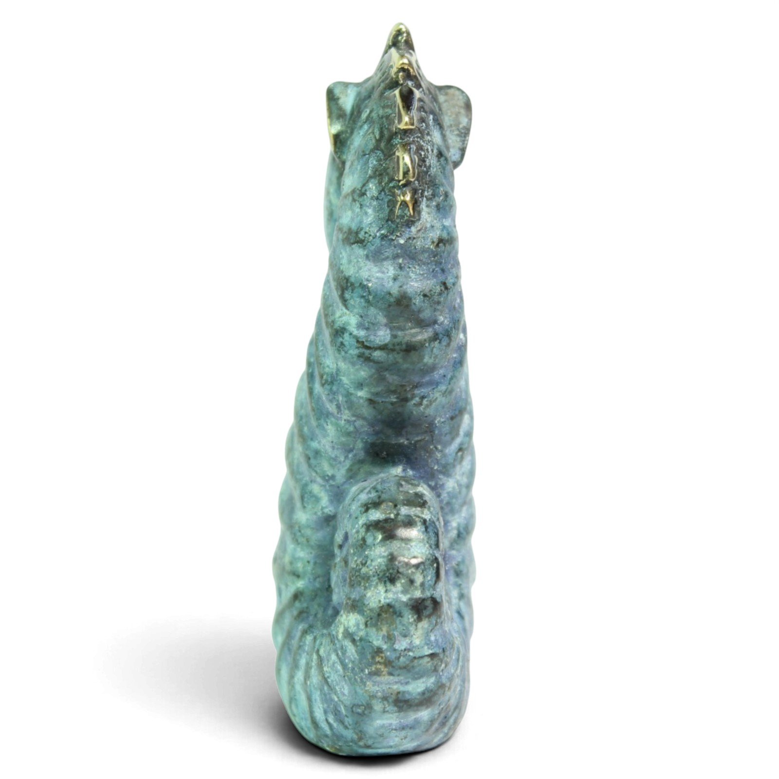 Back view of brass seahorse figurine showing textured spine and crest