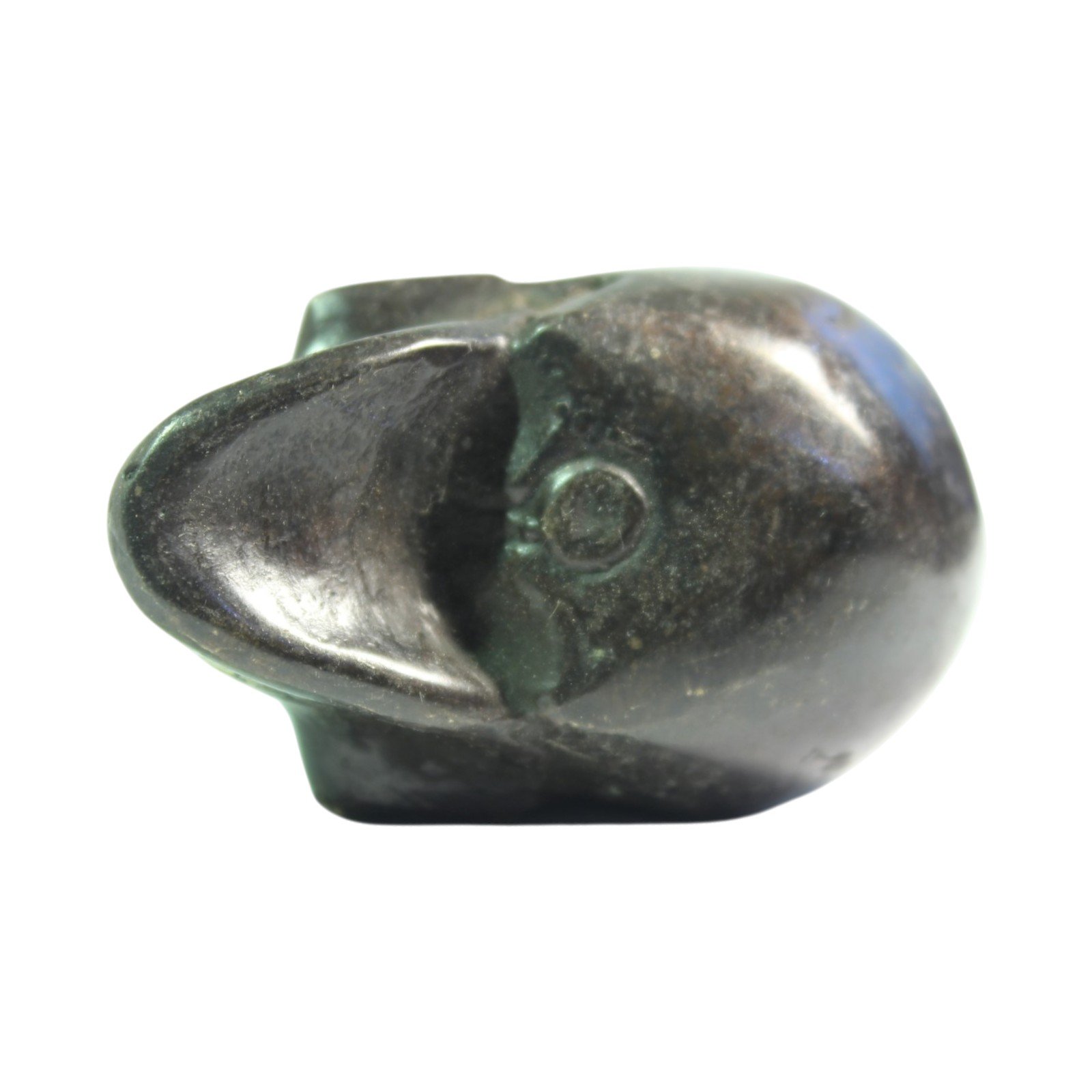 Back view of the brass skull figurine showing smooth rear casting
