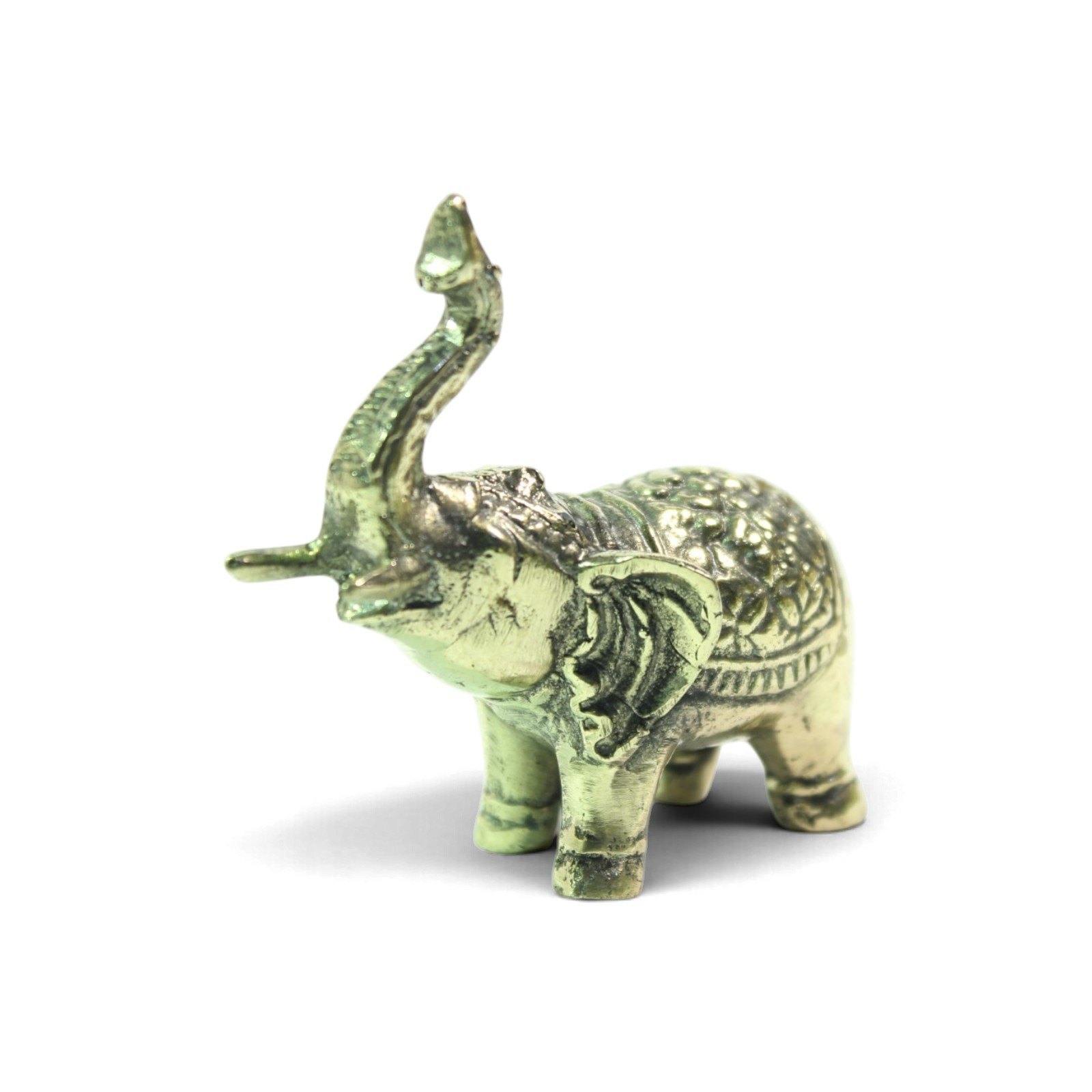 Small brass elephant figurine with trunk raised, side view showing textured back pattern