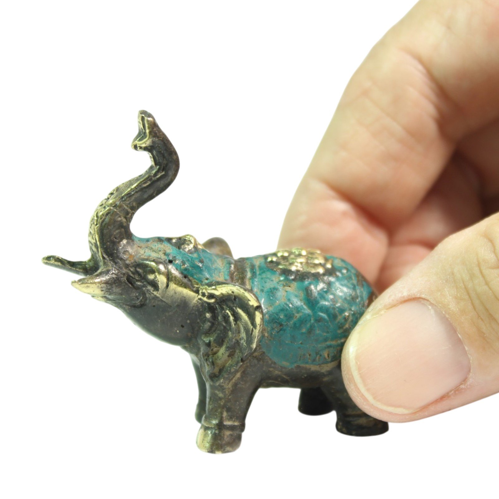 brass elephant figurine showing full body and patina pattern