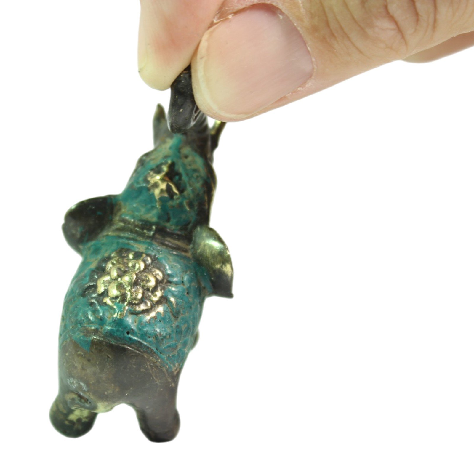 brass elephant figurine showing full body and patina pattern