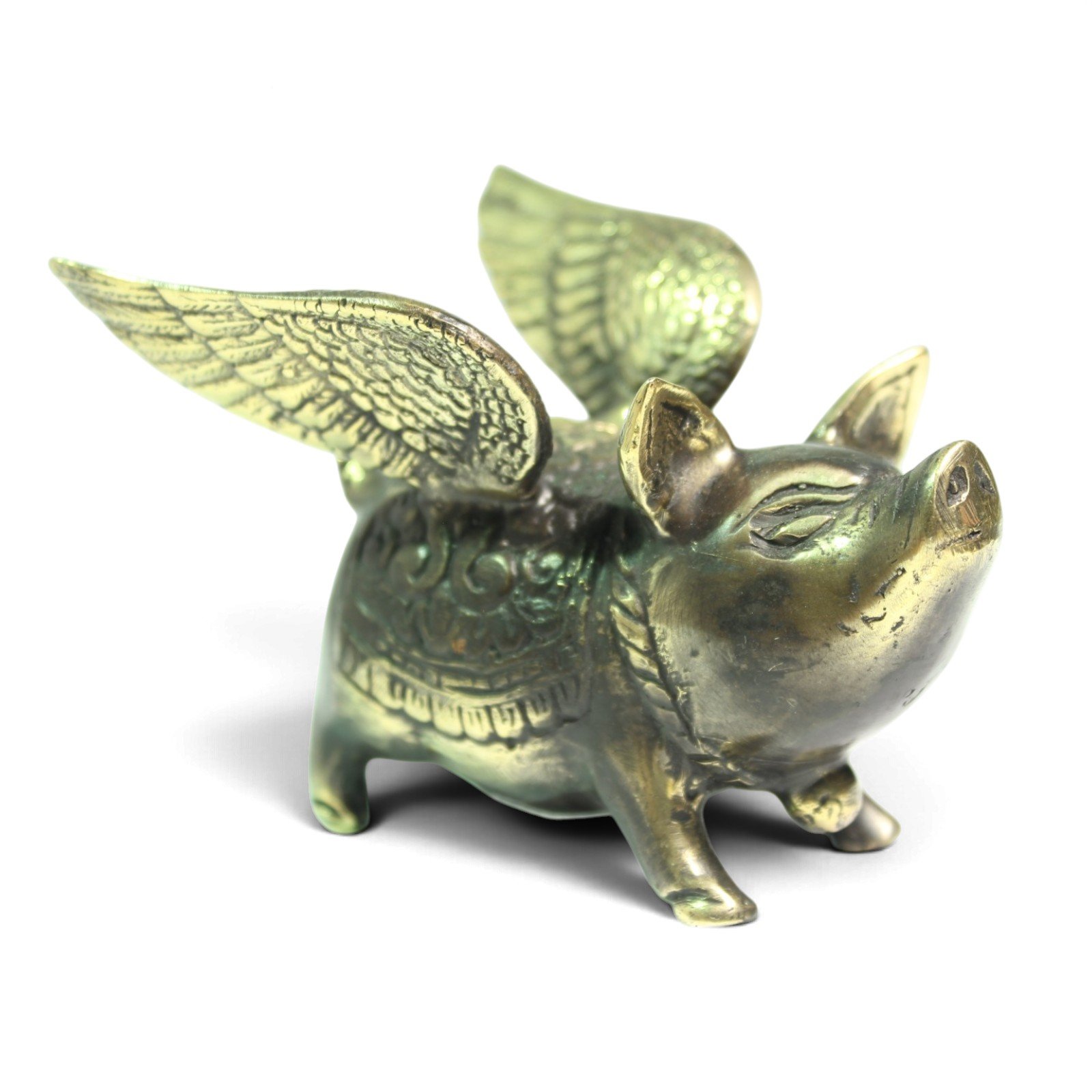 Brass winged pig figurine in black and gold two-tone finish, front angle view