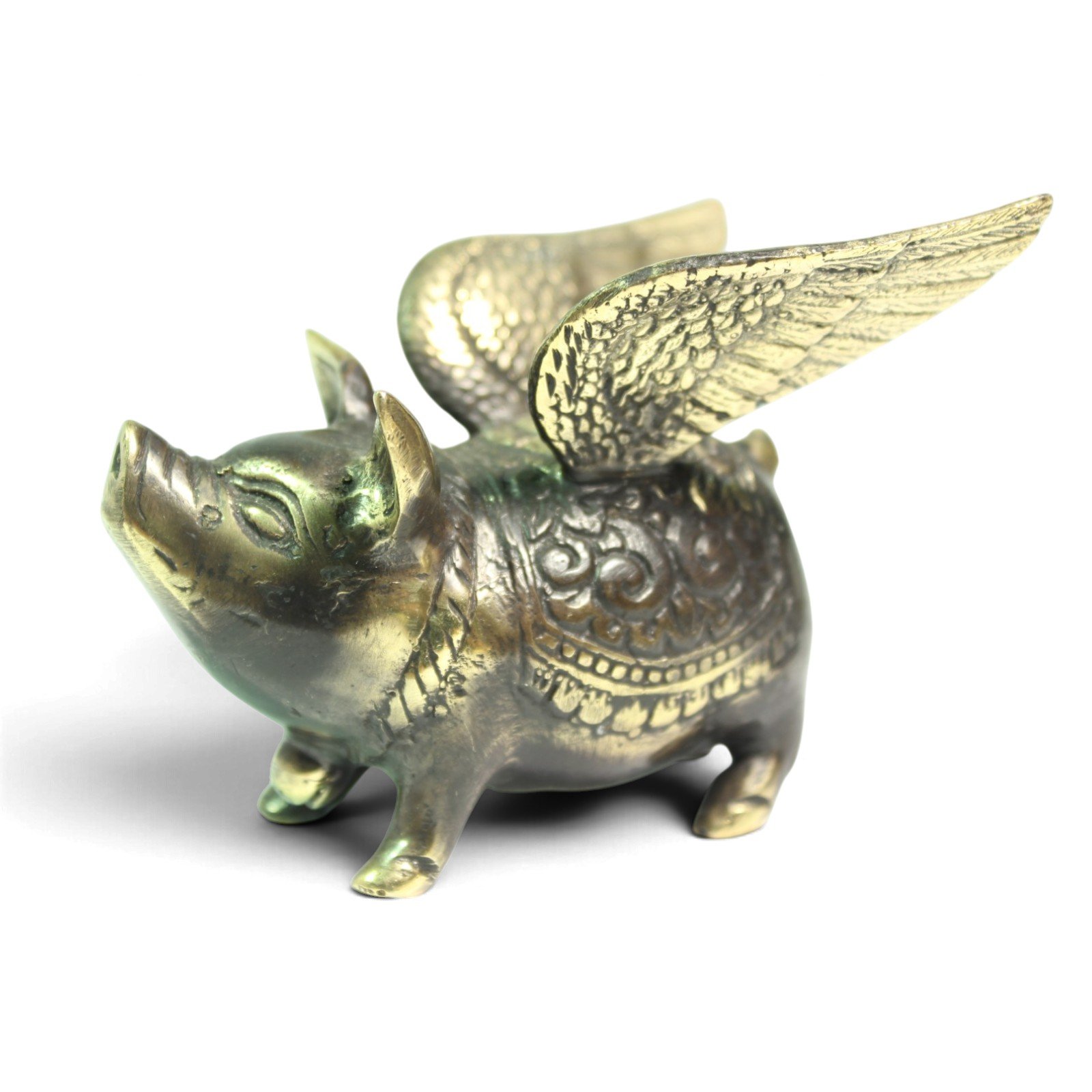 Close view of the winged pig's face and ornate carved back detail