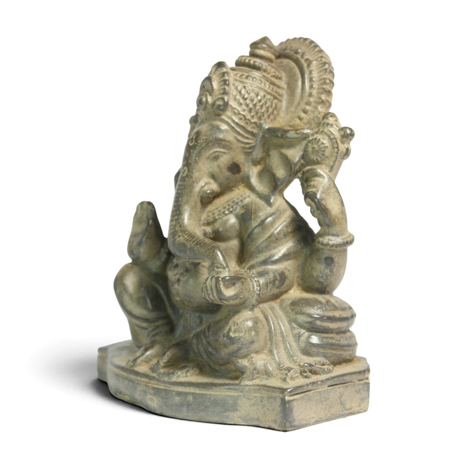 Opposite side angle of Ganesha statue highlighting trunk and shoulder detail