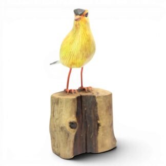 Hand-carved wooden American Goldfinch figurine from Bali in bright yellow with black cap, standing on wood base