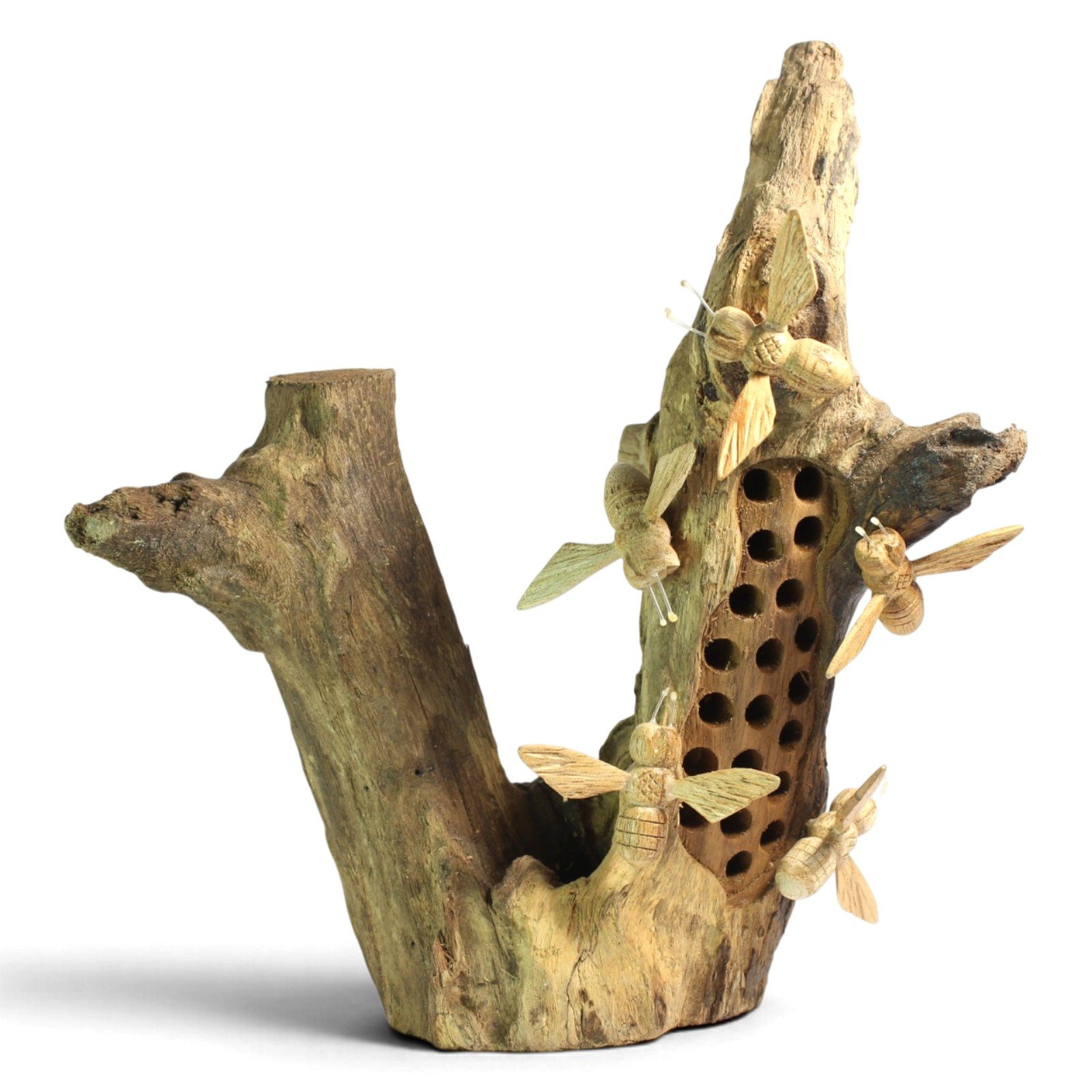 Full view of hand-carved wooden bees on a parasite wood hive sculpture