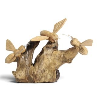 Three hand-carved wooden bees perched on a gnarled parasite wood base