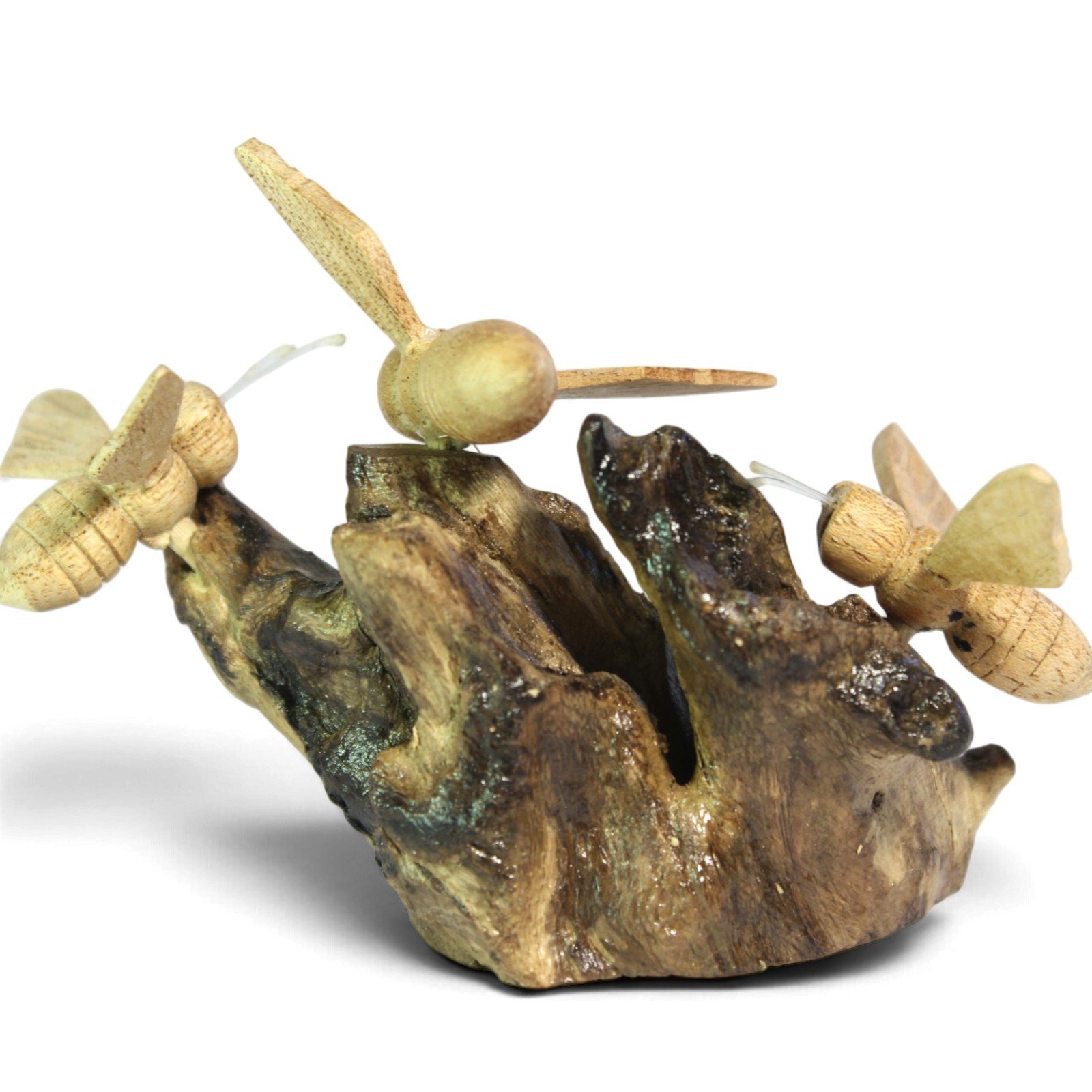 Three hand-carved wooden bees perched on a gnarled parasite wood base