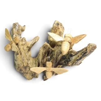 Three hand-carved wooden bees perched across a pale, weathered parasite wood base