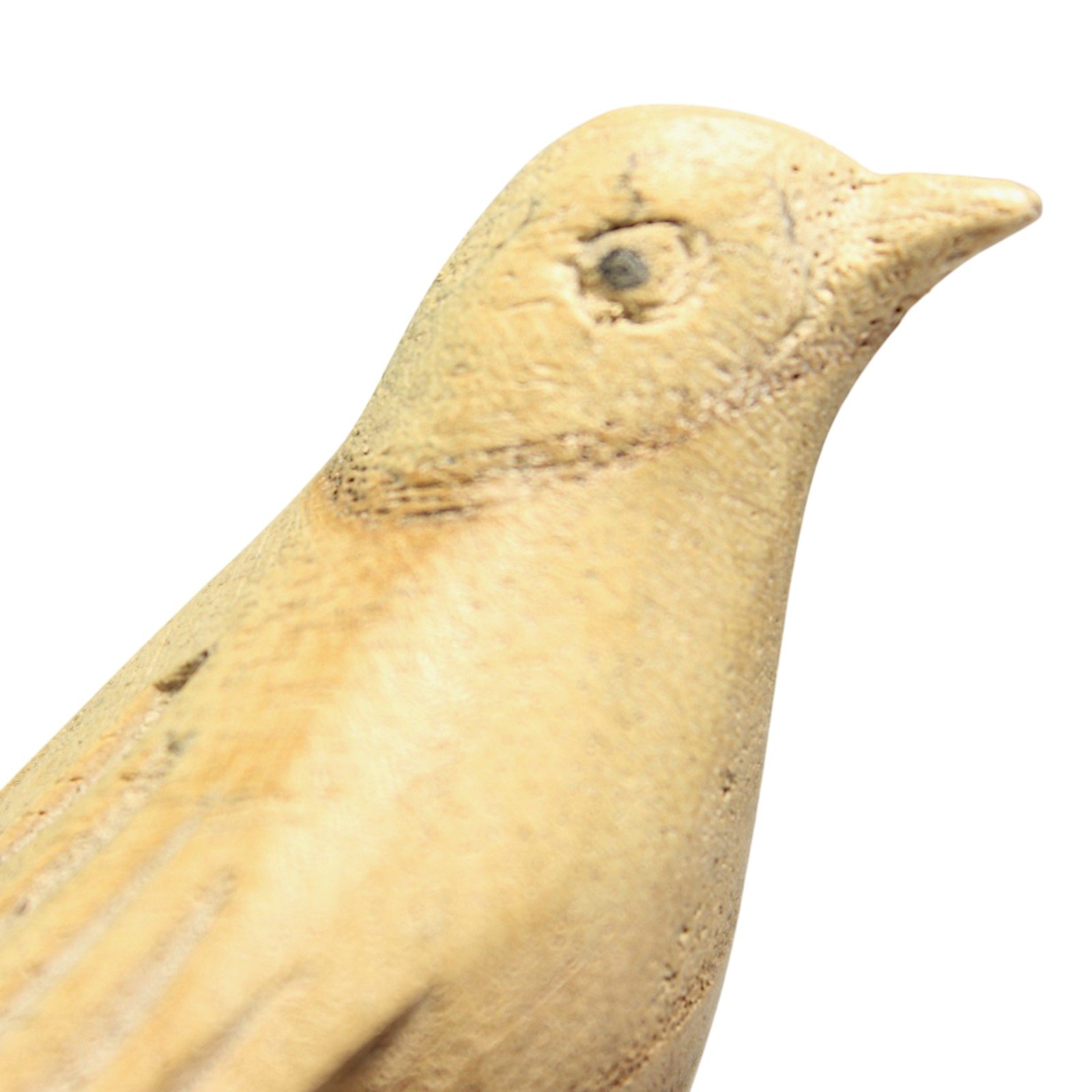 Close-up of the bird's neck, beak, and hand-carved eye against the wood grain