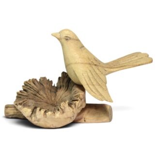 Hand-carved wooden bird perched over a rippled parasite wood base, side view