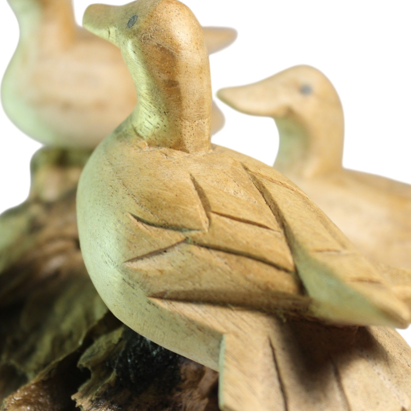 Close-up of a duck's back showing hand-carved feather strokes and painted highlights