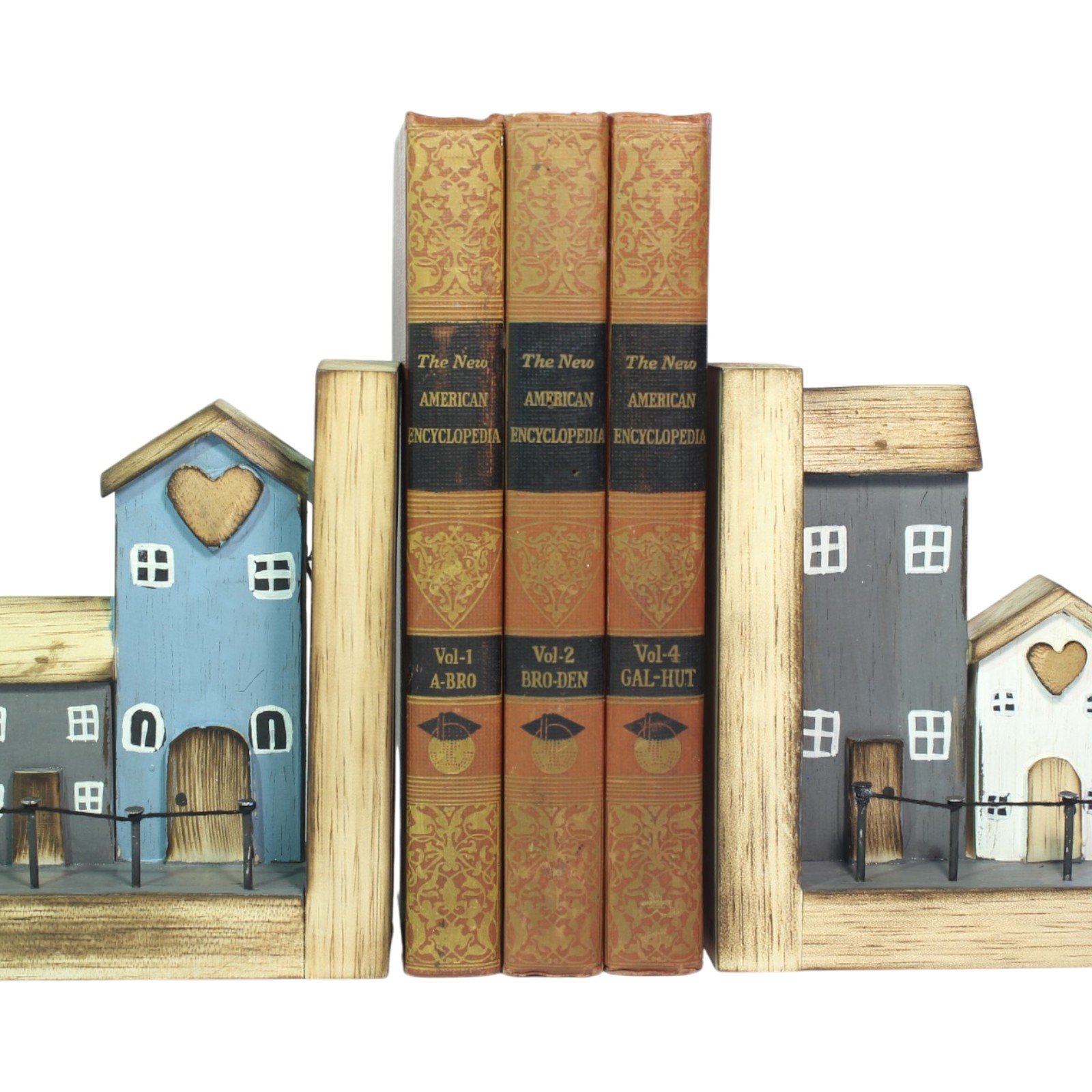 Wooden cottage bookends in use holding a set of vintage encyclopedia books upright