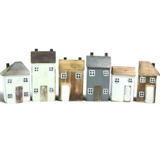 Full set of six hand-carved wooden houses in mixed colours lined up in a row