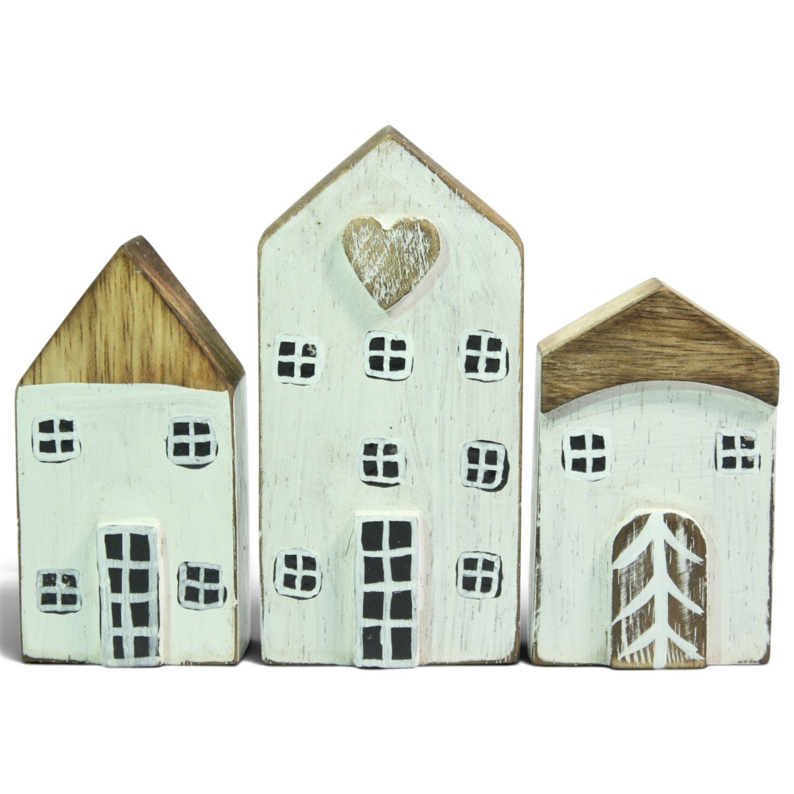 Three hand-carved wooden houses in white and mint, front view showing painted windows and doors