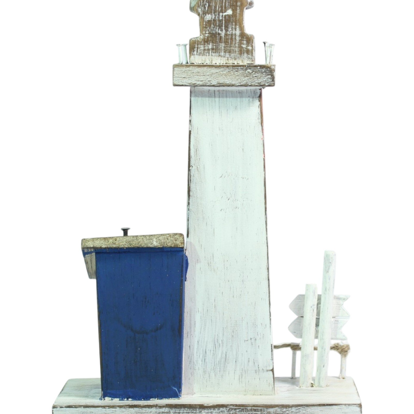 Rear view showing the back of the blue cottage and lighthouse tower