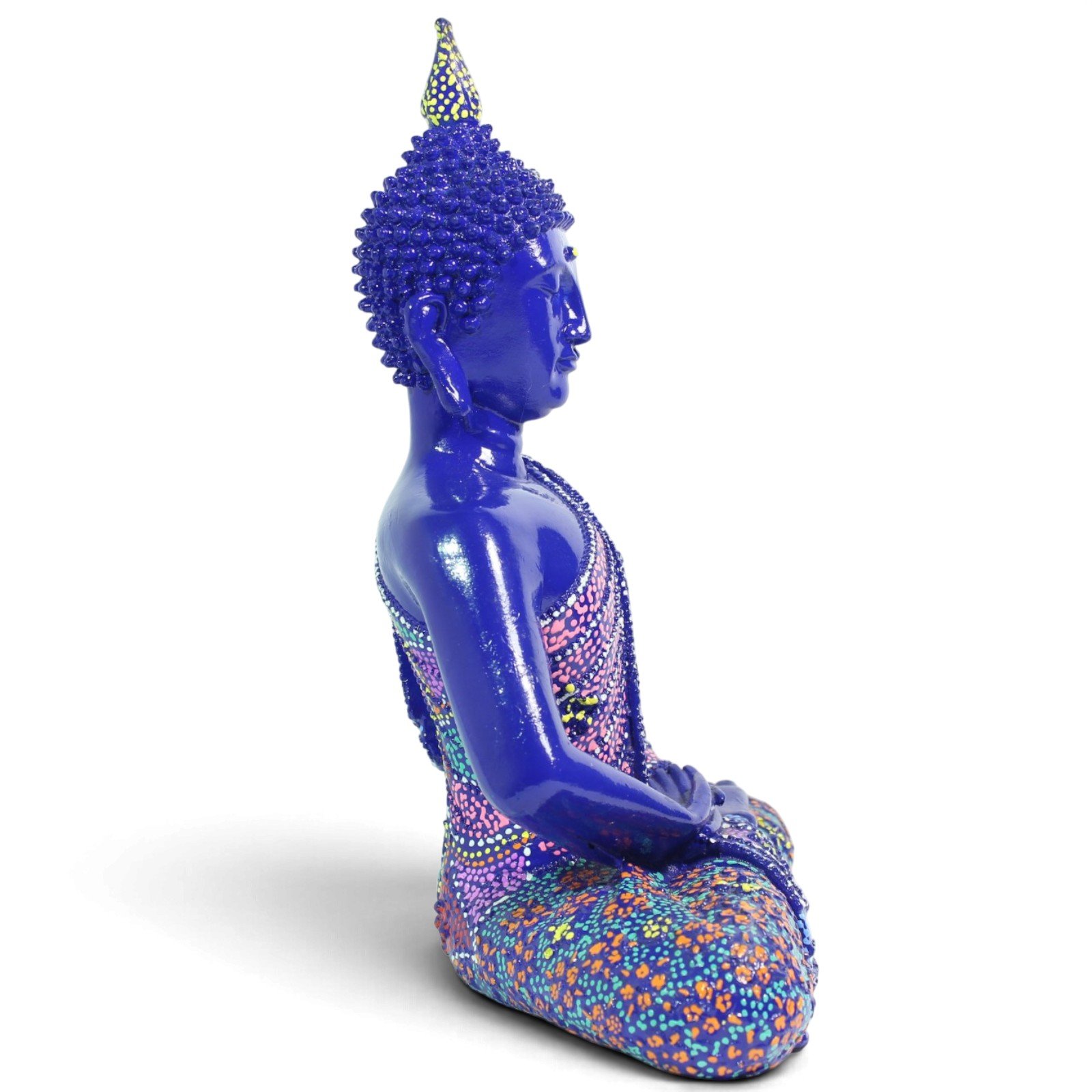 Three-quarter side angle of Buddha figurine showing hand position and robe