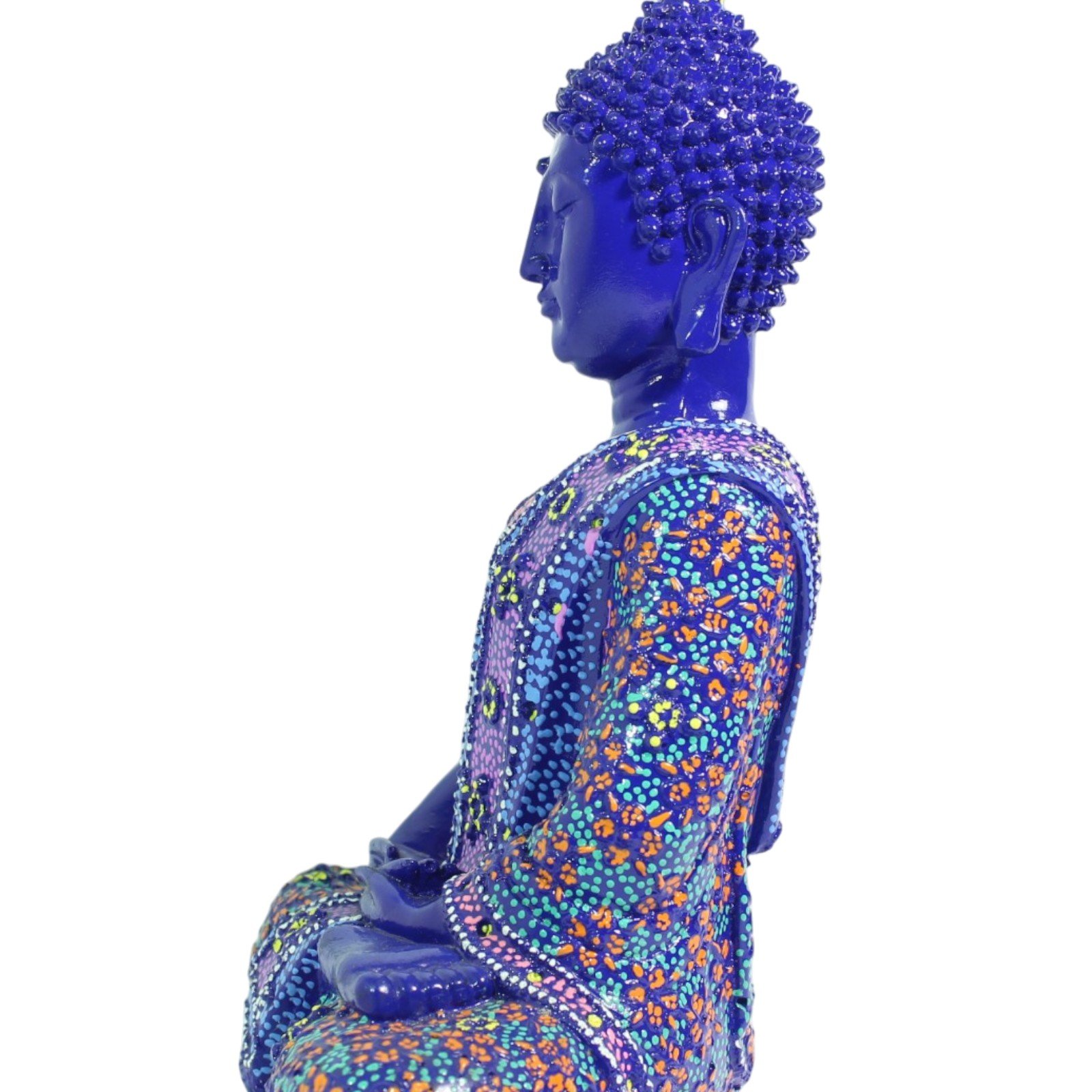 Side profile of blue Buddha figurine showing seated posture