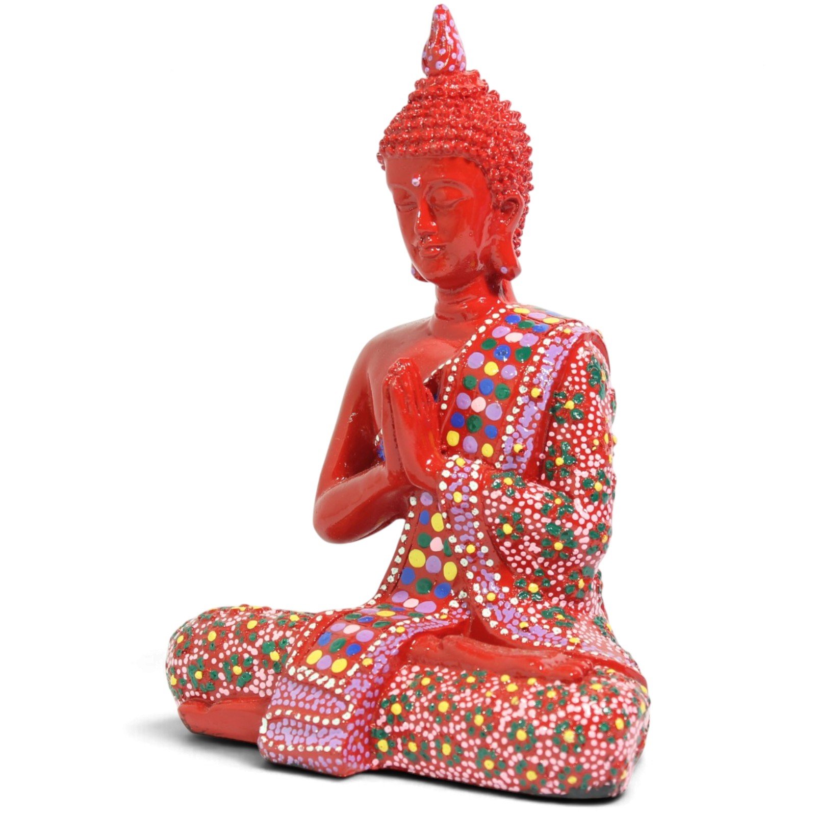 Three-quarter angle view of the seated red Buddha figurine