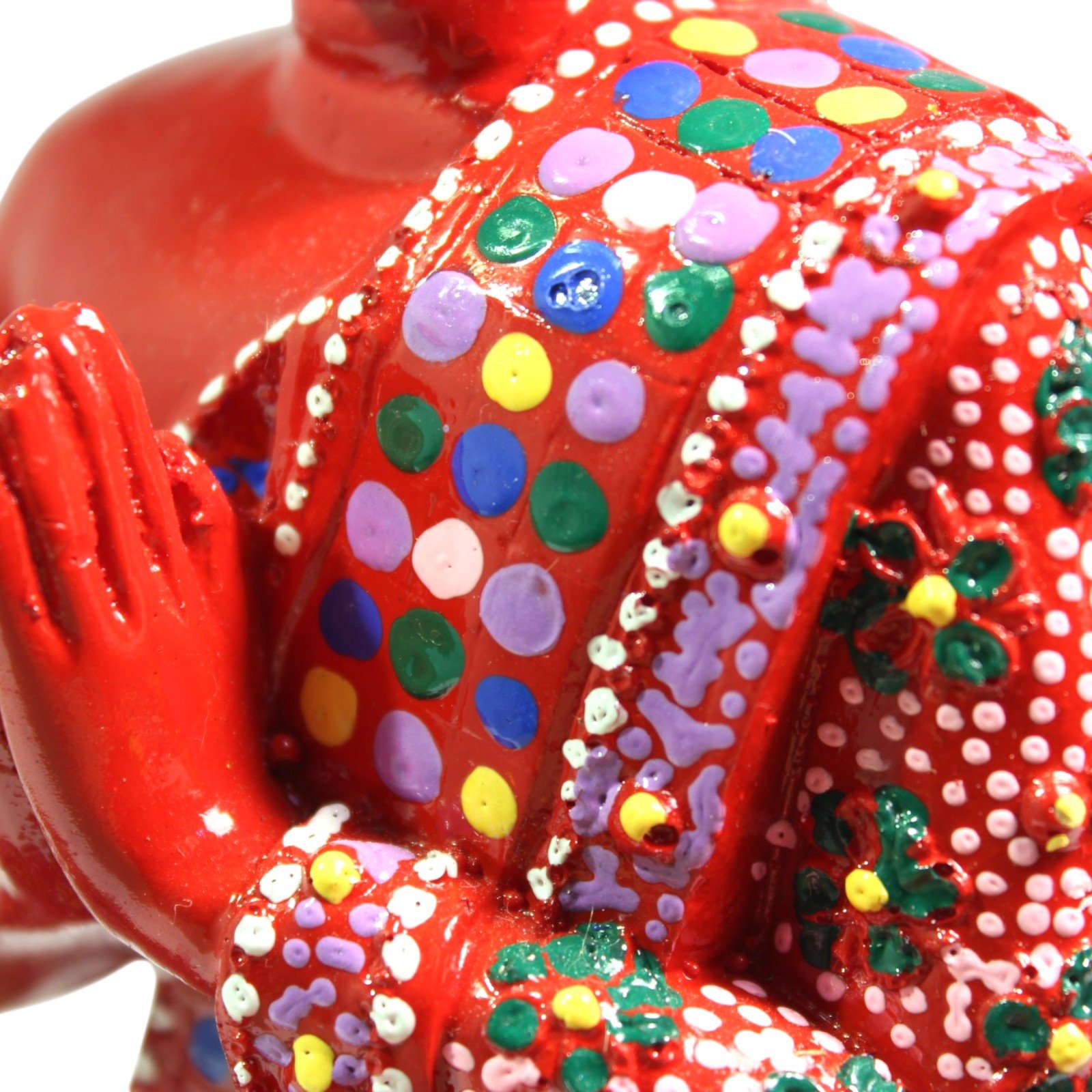 Macro shot of hand and colorful dotted robe pattern texture