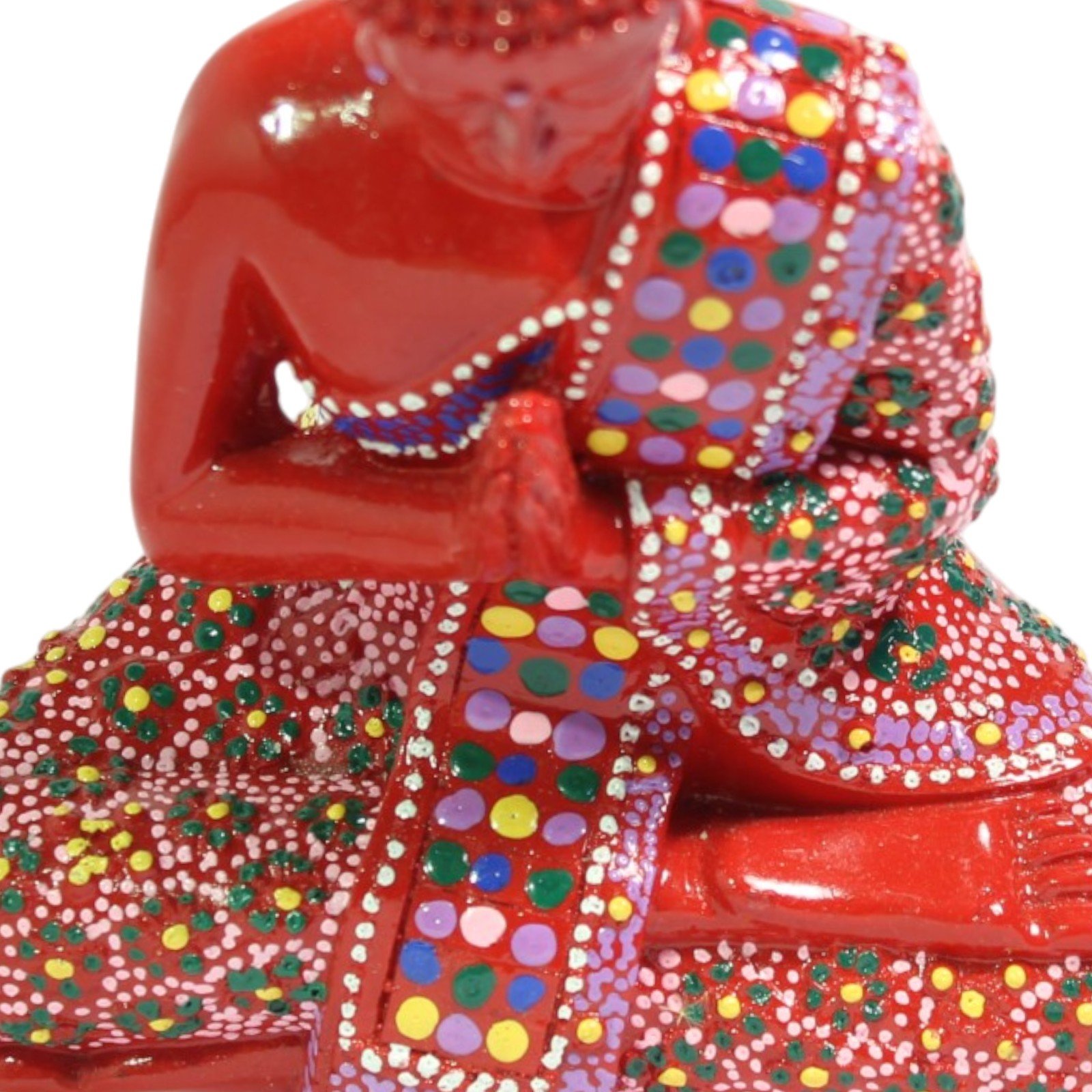 Top-down close-up of shoulder and robe dot pattern detail