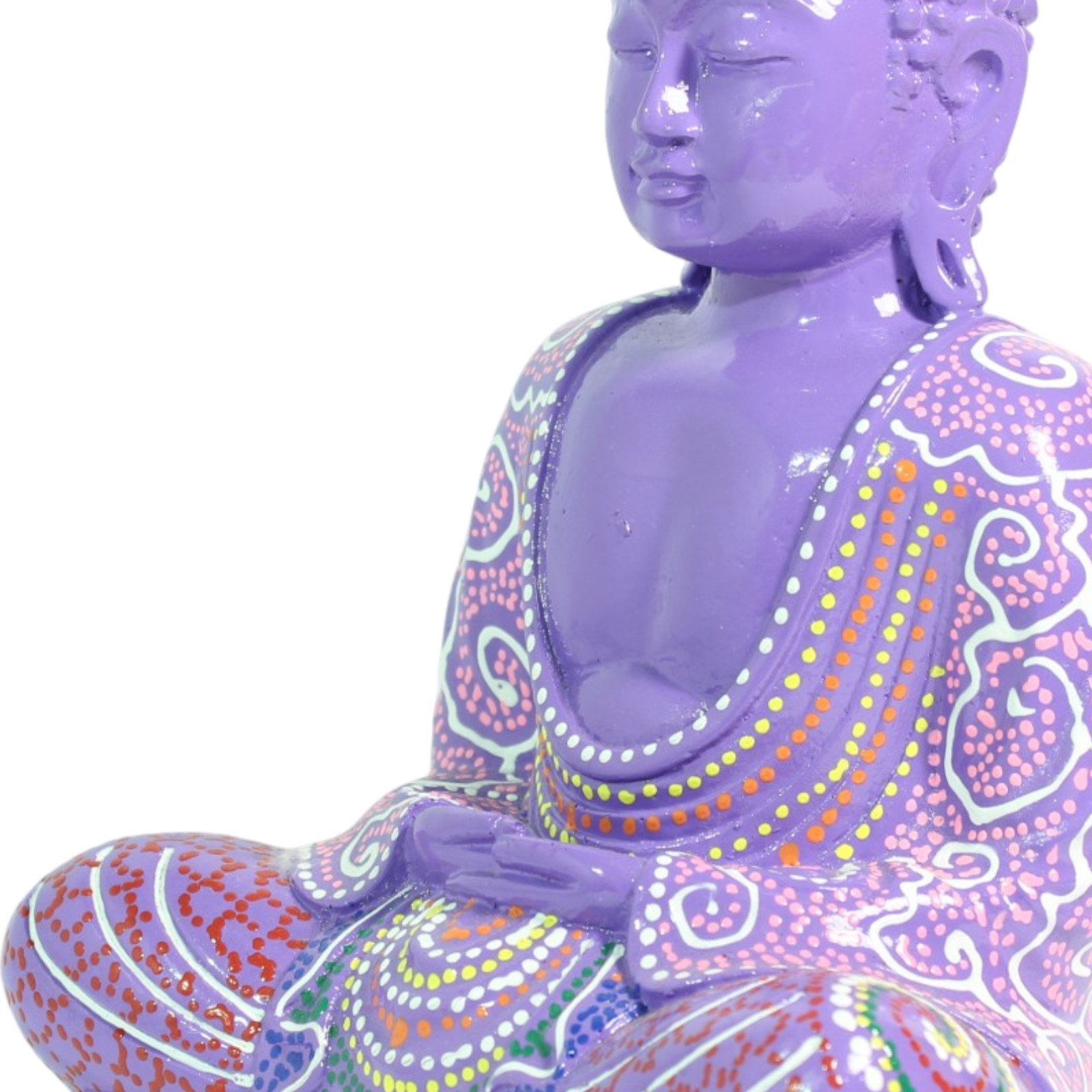 Close-up of the Buddha's torso showing hand-painted dot and swirl patterns on the purple robe