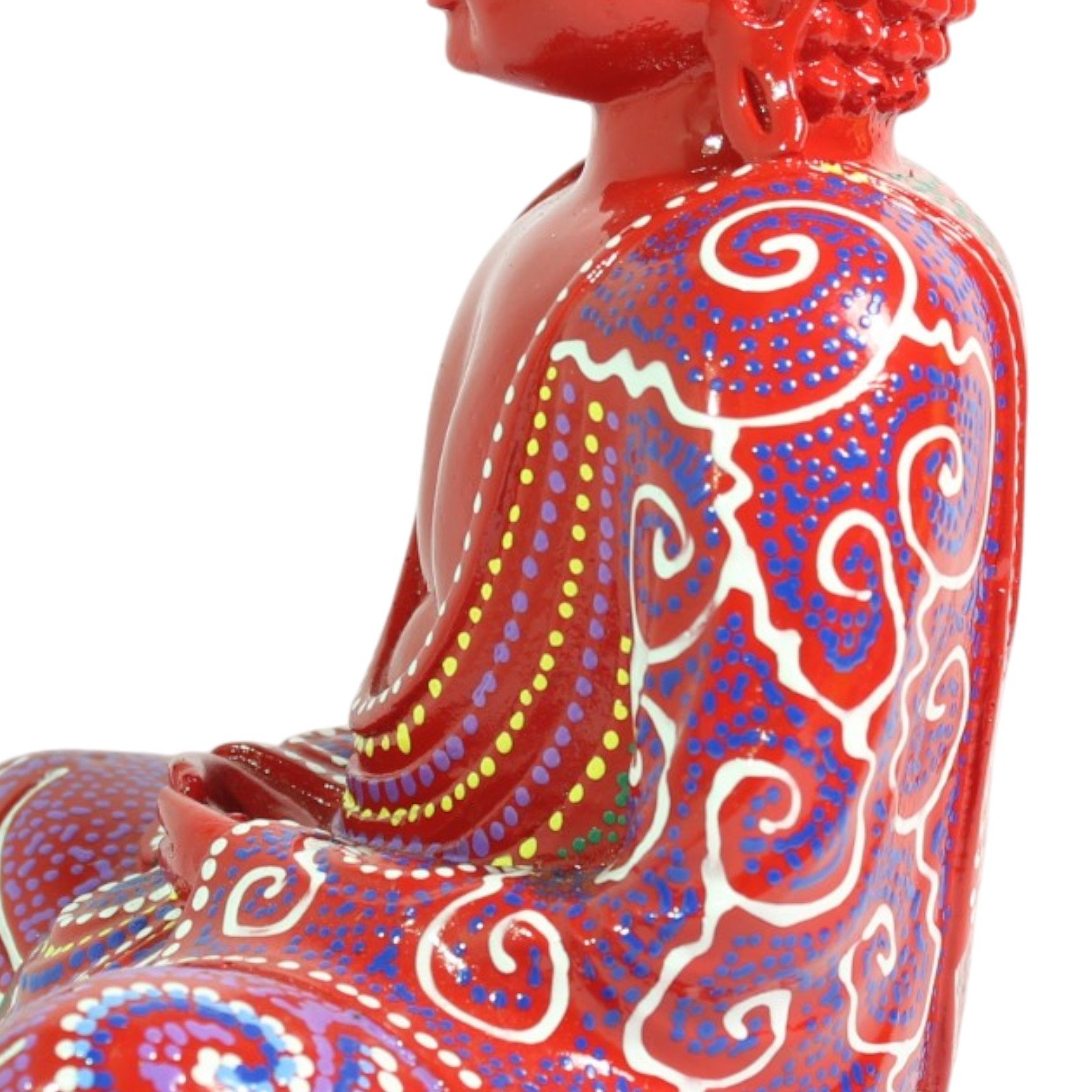 Angled detail of the shoulder area showing swirl motifs and dotted robe patterns