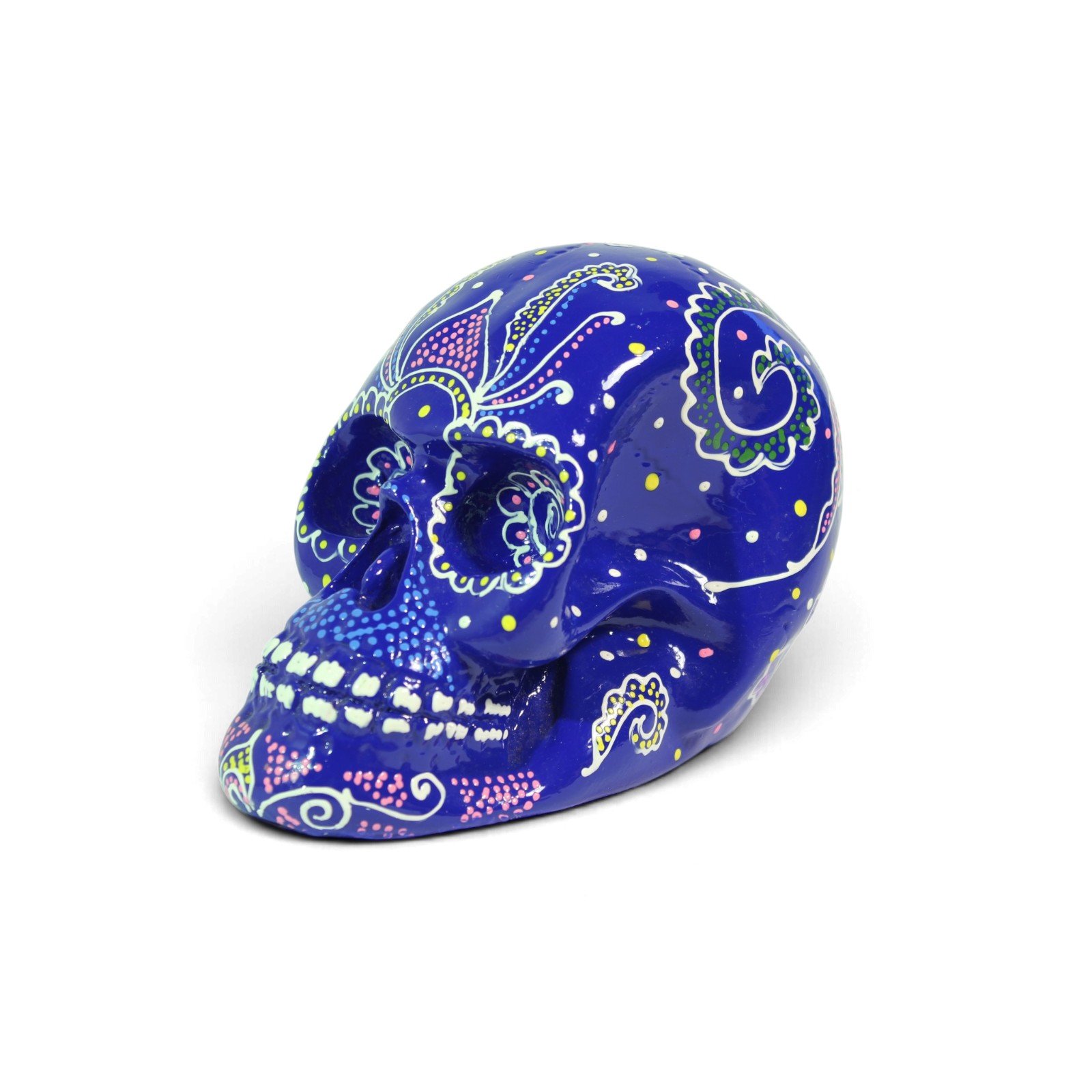 Three-quarter angle view of the painted blue skull showing eye and jaw detail