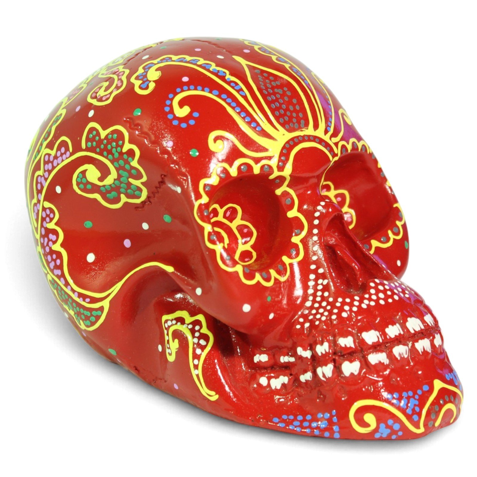 Front-left angle view of red hand-painted resin skull with floral patterns