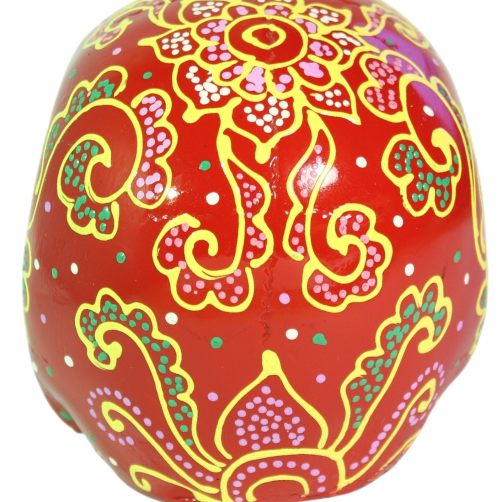 Left side profile view showing swirling paisley design on the cheekbone
