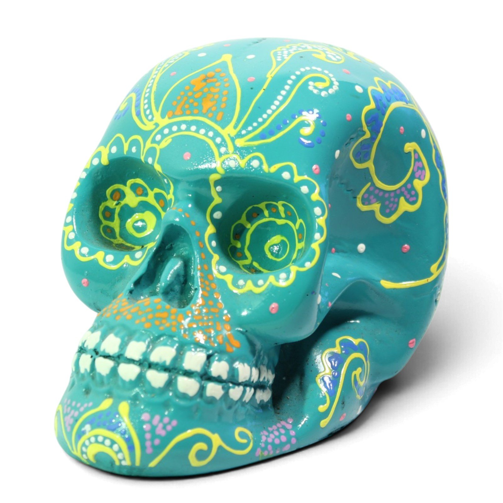 Front angled view of the full teal painted skull figurine