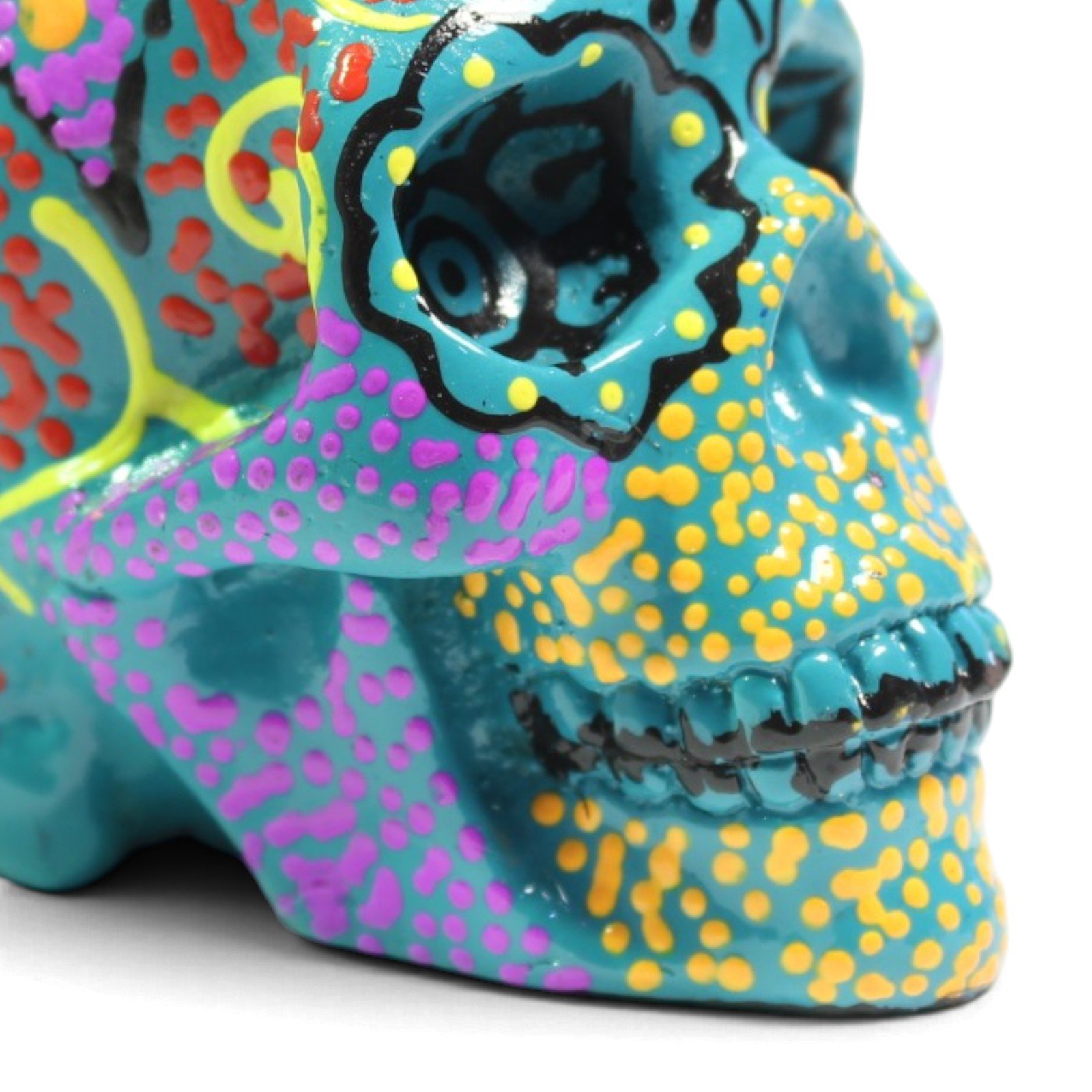 Close-up of nose and teeth area showing dotted paint detail