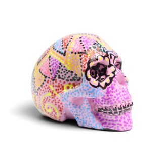 Three-quarter angle view of the skull highlighting the painted eye and jaw