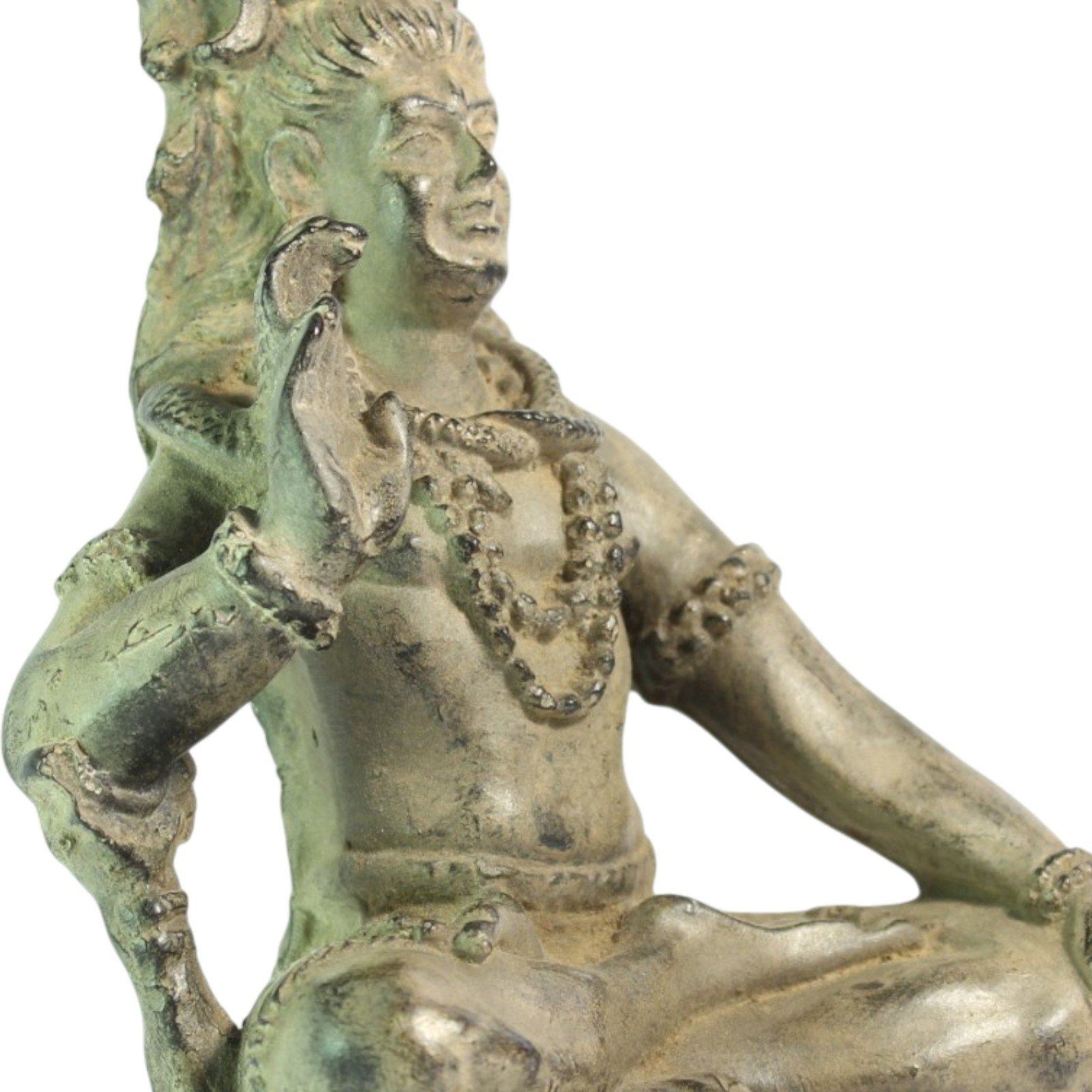 Close-up of Shiva statue's chest, necklace, and coiled serpent detail