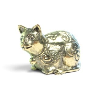 Solid brass cat figurine with bell collar, side angle view