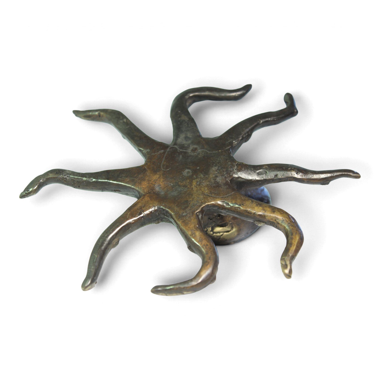 Brass octopus figurine seen from an elevated angle showing detailed bottoms