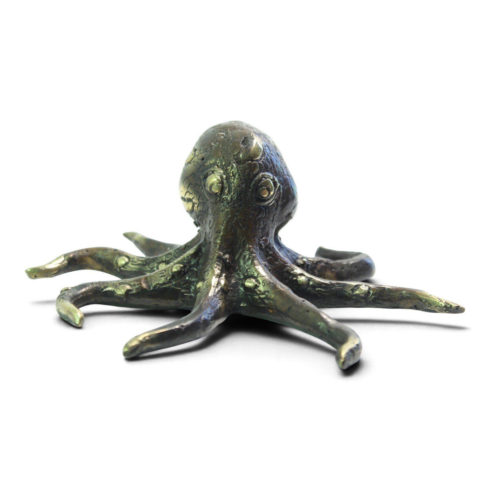 Brass octopus figurine seen from an elevated angle showing all eight arms