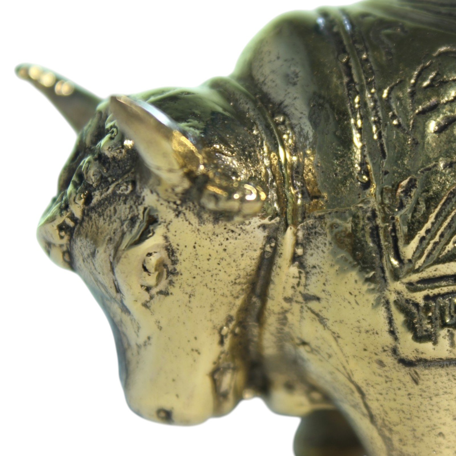 Handvara brass bull figurine showing horns and face detail