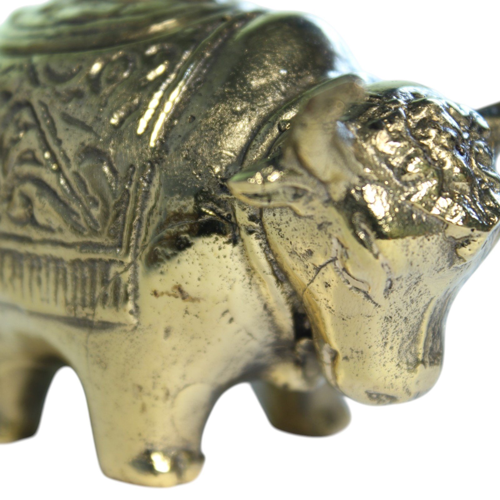 Handvara brass bull figurine showing horns and face detail