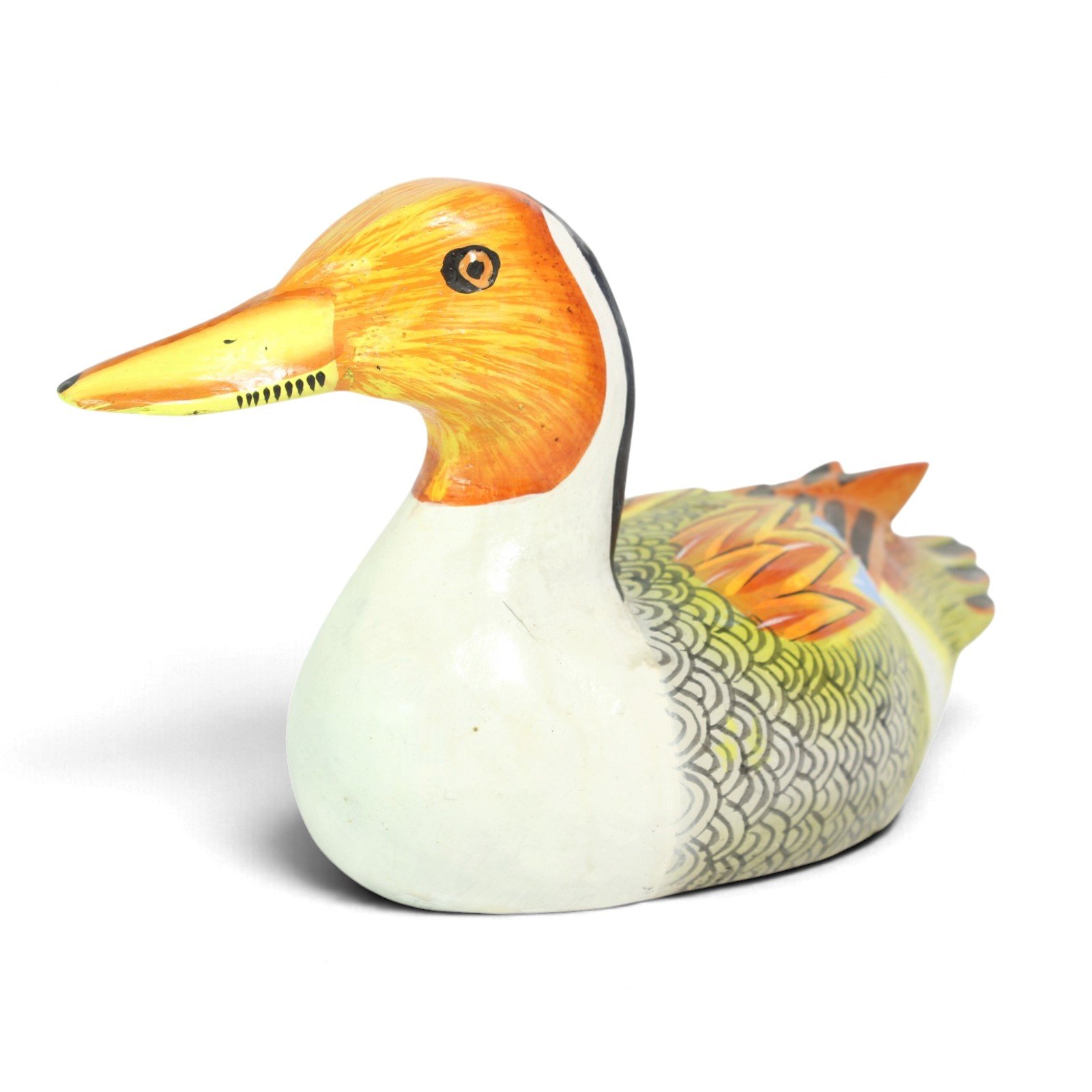 Hand-carved wooden duck figurine with orange head and painted scale-pattern feathers, three-quarter view