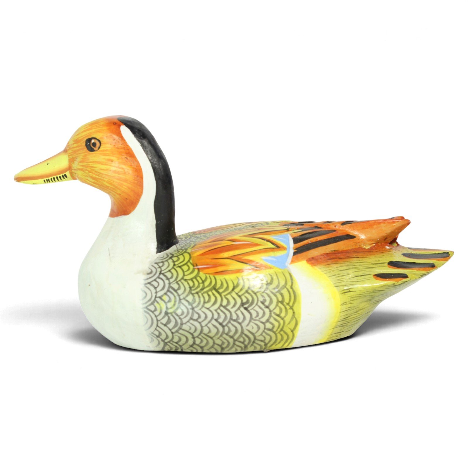 Reverse side profile of the wooden duck decoy showing head turned left and painted wing pattern